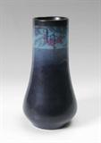 Lot 1045:  1913 ROOKWOOD VASE SIGNED LORINDA EPPLY: Deep blue ground with band of leaves and berries near lip. Marked with Rookwood 1913 mark, Epply signature, 12786?, and X mark. Measures 12 3/8'' h. x 6 1/2''.
CONDITION: Crazing throughout, minor abrasions.