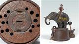 Lot 1101:  ELEPHANT & THREE CLOWNS MECHANICAL BANK: J & E Stevens with English and American patent dates on base, original trap. Pull legs of back clown, trunk rotates to push coin in bank. Measures 5 3/4'' h. x 5 1/2''.
CONDITION: Loss of paint.