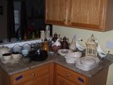 Lots of kitchen items, Lodge cast iron, Corningware Creations, Crate and Barrel and more.