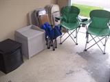 Hose reel, storage bin, card table and chairs and more.