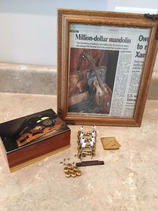 Original keys, rosewood bridge, hardware, box and framed newspaper article from the "million-dollar mandolin" donated to the Country Music Hall of Fame : $10,000