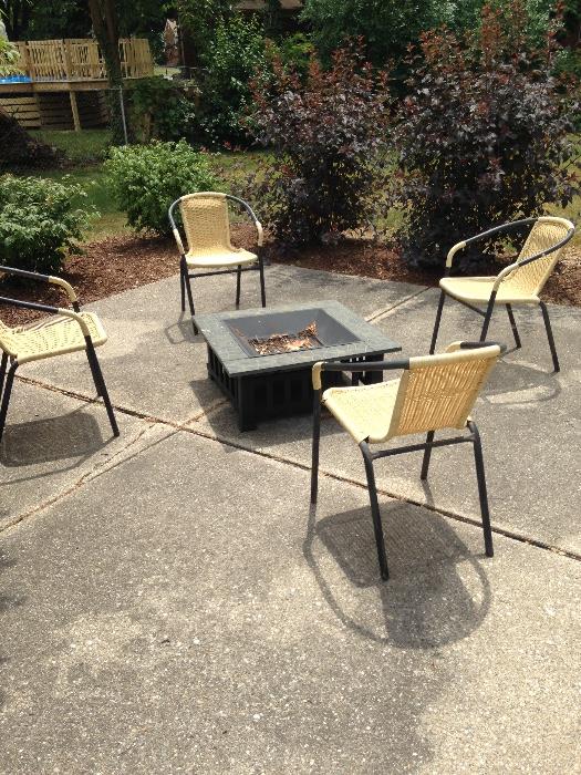 Outdoor fire pit and stacking chairs