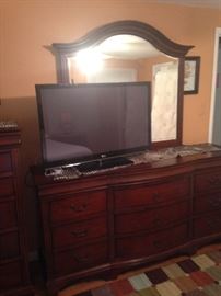 The matching dresser with mirror