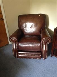 This is a really comfortable recliner from Art Van with brass nailhead trim