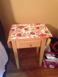 Cute nightstand with drop sides