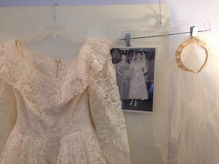 Another view of the 1955 wedding gown with photo, invitation and veil! 