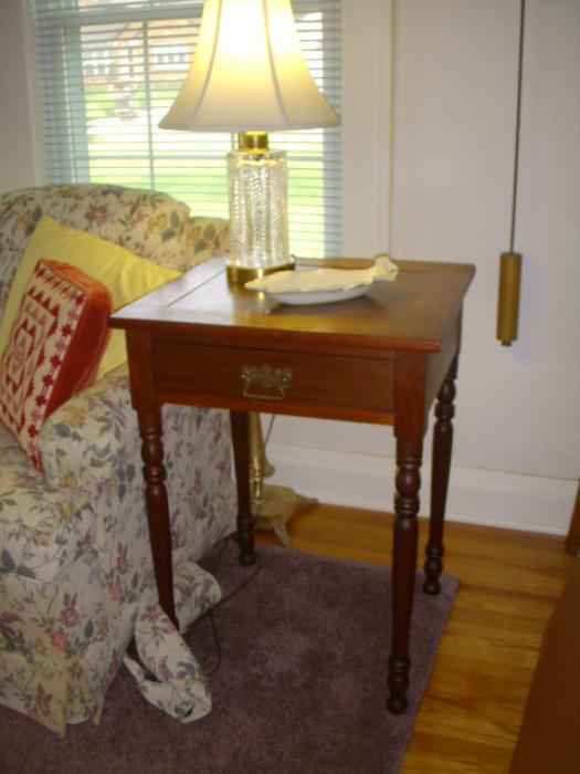 One drawer stand dated 1886.  Lamp on stand is signed Waterford
