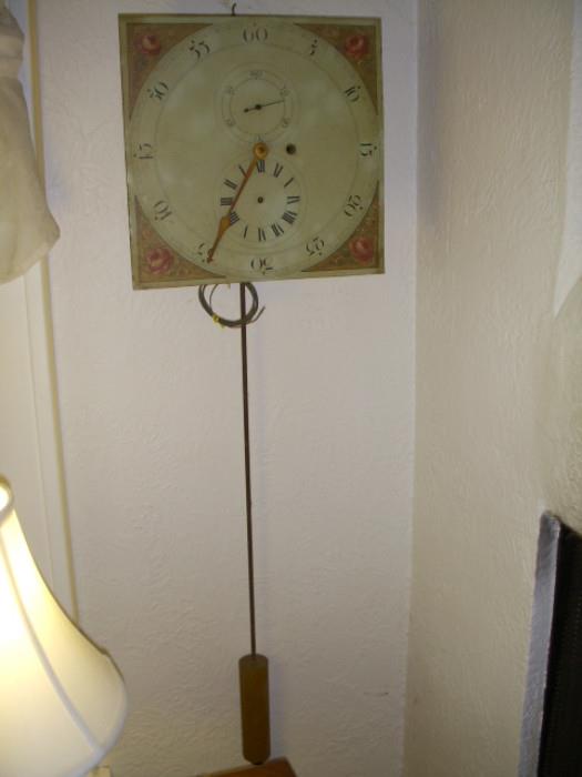 Astrological wag-on-wall clock....as found.  Appears complete except the hour hand is missing.  Included is an old photo of the clock showing the hour hand, which may help in its being reproduced