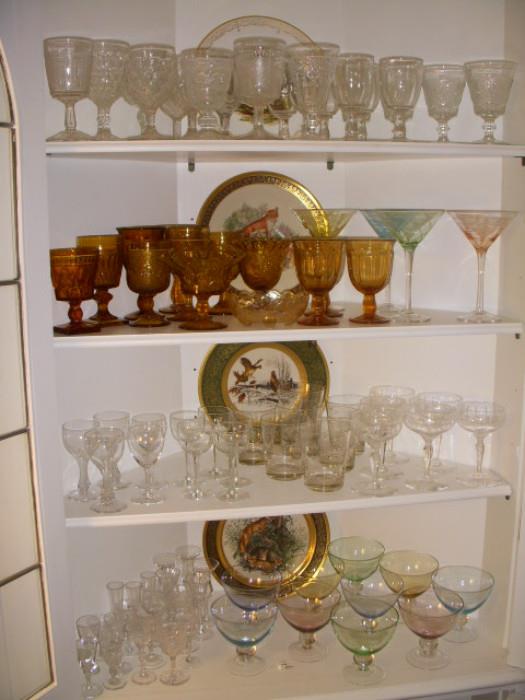 Assorted stemware.  Plates are "Boehm" by Lenox