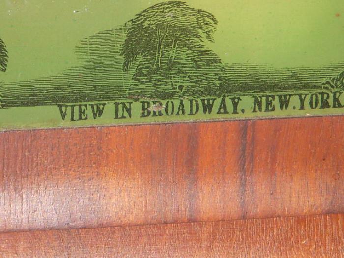 View on Broadway is the scene on the reverse painted tablet (glass door)
