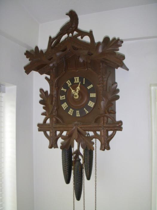 Cuckoo clock....30 hour....cuckoo and quail not working, but clock runs and keeps time....silently....