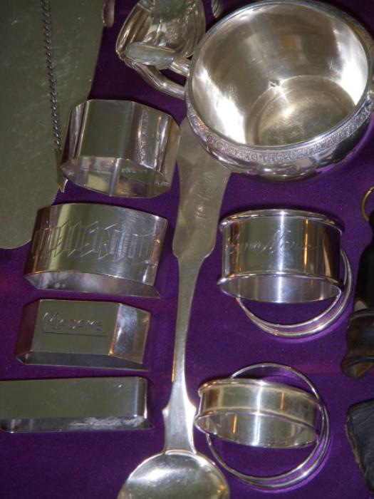 Sterling napkin rings....two on left in middle:  "Madame" & "Messieur"