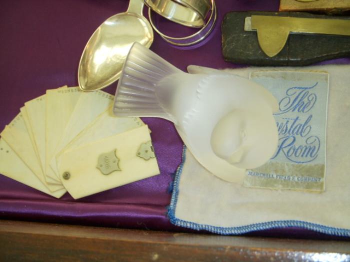 Ivory "Diary" and Lalique sparrow in a bag from "The Crystal Room, Marshal Field & Company (Chicago)