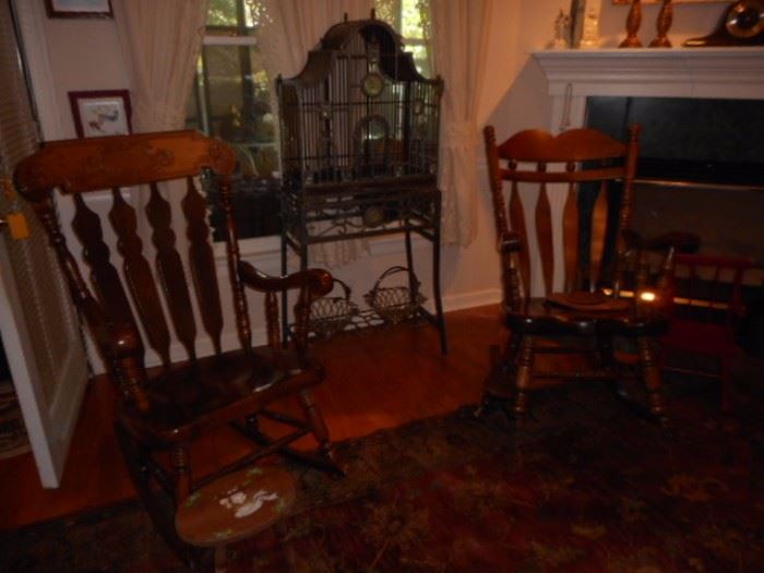 Two great rocking chairs and a wonderful copper and iron bird palace!! 