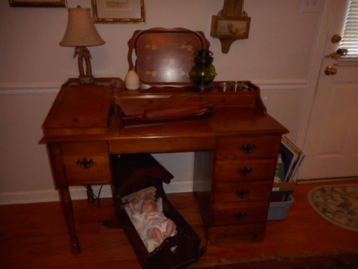 Maple desk, cradle with custom made porcelain doll baby
