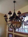 Verdigris and Antique Brass African Wildlife Chandelier:
This chandelier was purchased from Fischer-Gambino located in New Orleans, LA. Here is link to currently purchase new and to view details: http://www.lightingneworleans.com/product/verdigris-and-antique-brass-african-wildlife-chandelier/  Owners paid $13,000  and we're selling it for $4600. Owners will pay for shipping if needed, and there is no tax. Please contact Whitney 2176496288 text/call with any questions and interest!