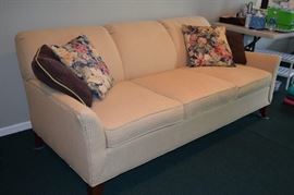 Upholstered feather sofa