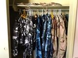 Closet of Camoflauge gear, most brand new, never worn