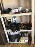 Gun holders, holsters, scabbards, Bianchi holster sets, pistol grips, etc.