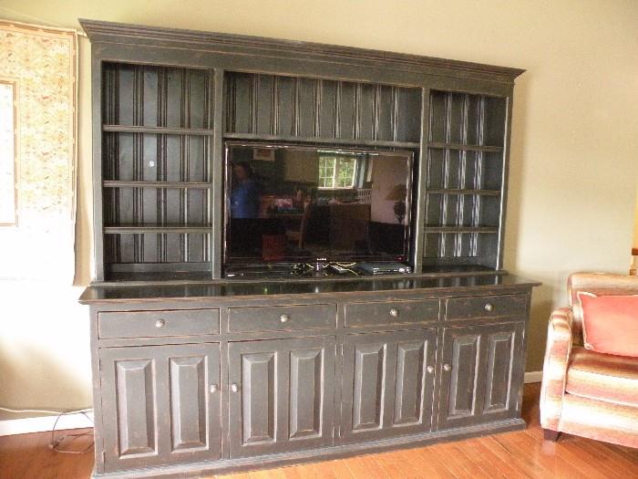 Entertainment unit is 7' tall, 8' long. Comes in two pieces.  Must sell!