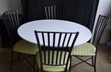 Kitchen dining table with four wrought iron chairs