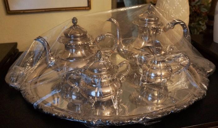 Sterling tea and coffee service with plated tray