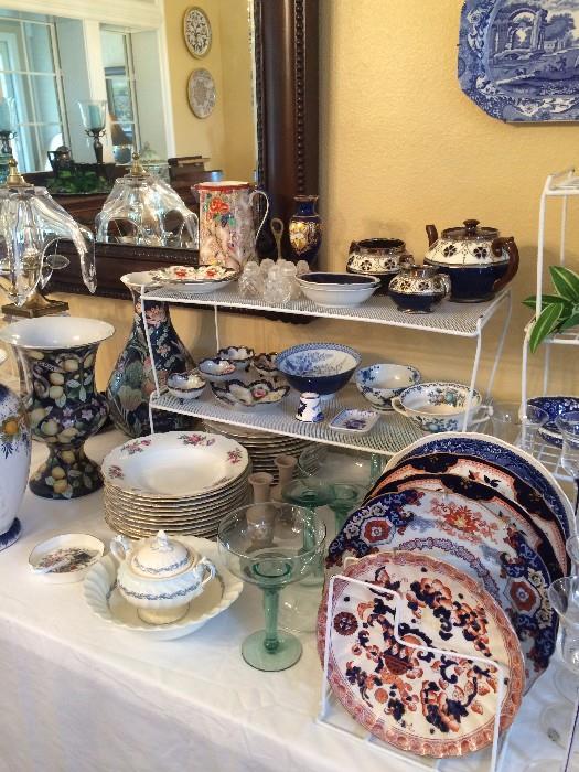 Variety of vases, dishes, and decorative plates