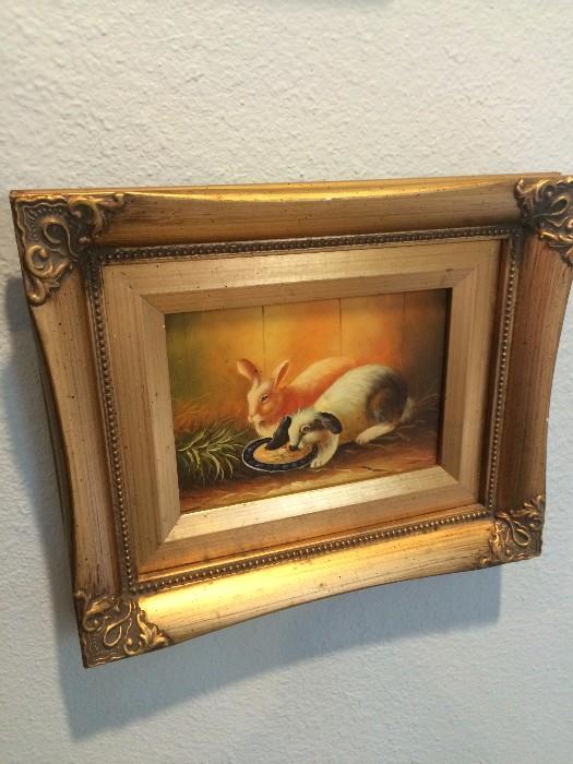 Framed oil of two rabbits 