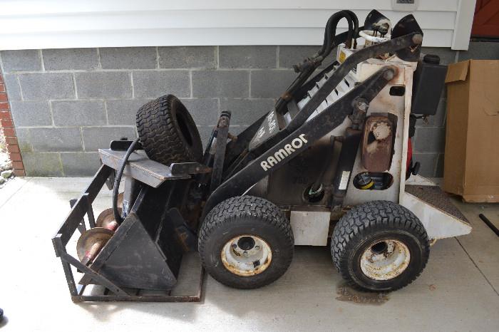 Ramrod Mini Skid Loader with Attachments in excellent working order, ready to put to work.