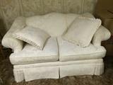 White loveseat ( some water stains)