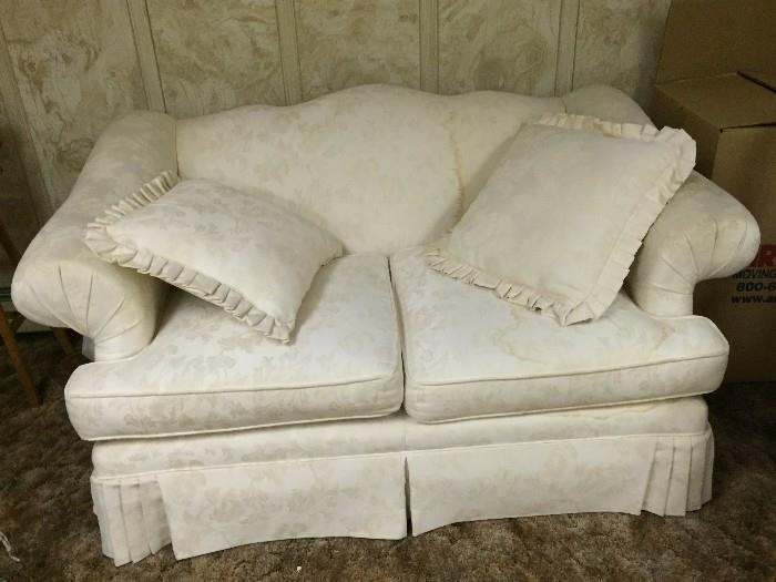 White loveseat ( some water stains)