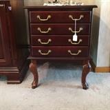 Unusual table with each drawer unfolds into a snack table