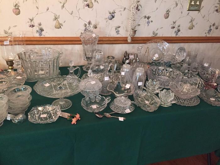 Table Full of a selection of  cut and pattern glass