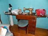 Sewing machine, stool, miscellaneous sewing items, costume jewelry, table lamp