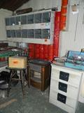 vintage bar stool, gas radiant heater, another tool box, shelves, another chicken nesting box, 3 drawer cabinet, old metal box - full.  