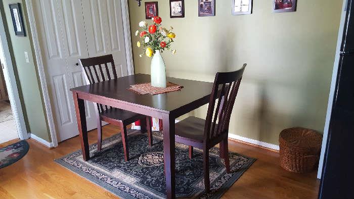 Wood table and four chairs    $200