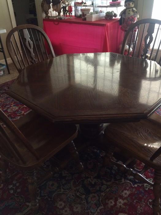 Octagon shaped game table with 4 chairs