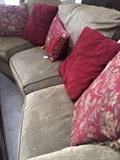 Curved sofa and decorative pillows
