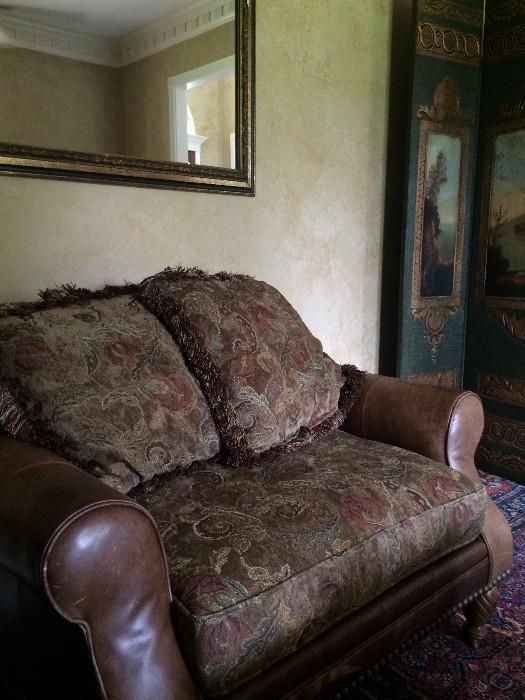 The over-sized chair matches the ottoman and sofa.