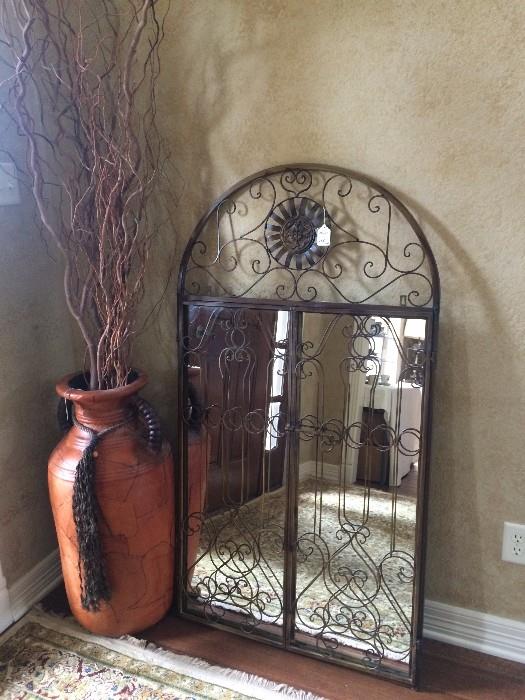 Large decorative urn and mirror