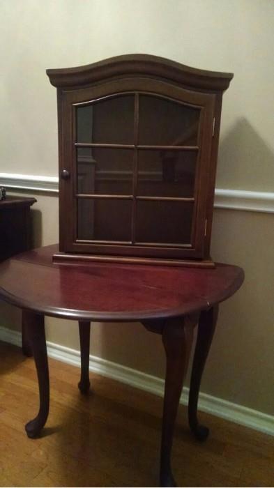 Small Queen Anne drop leaf table; curio cabinet 