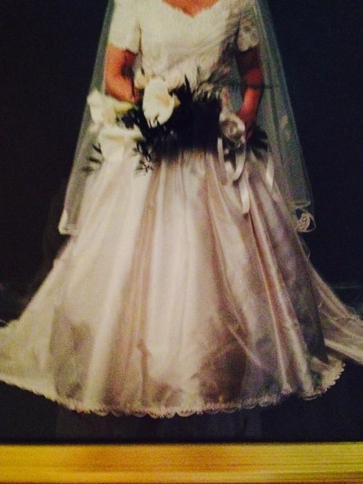 One of several consigned wedding dresses (designer Christos - Neiman Marcus); veil not included