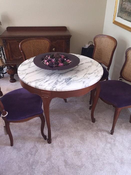 ROUND MARBLE GAME TABLE WITH PURPLE REUPHOLSTERED CHAIRS