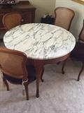 ROUND MARBLE GAME TABLE WITH PURPLE REUPHOLSTERED CHAIRS