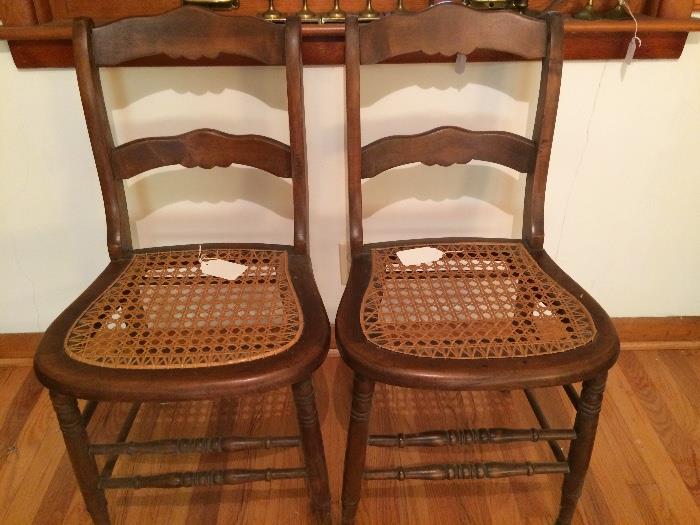pair of cane bottom chairs. one still available