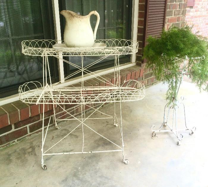Darling antique metal plant stand on casters