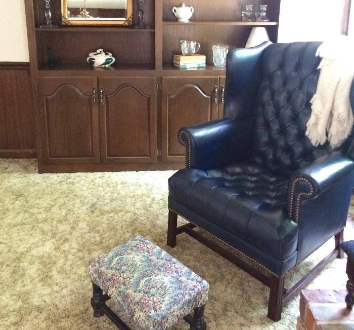 Executive tufted leather chair and upholstered ottoman