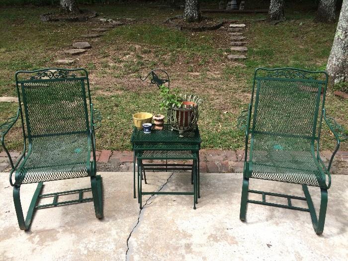 Green wrought-iron rockers with matching nesting-table set