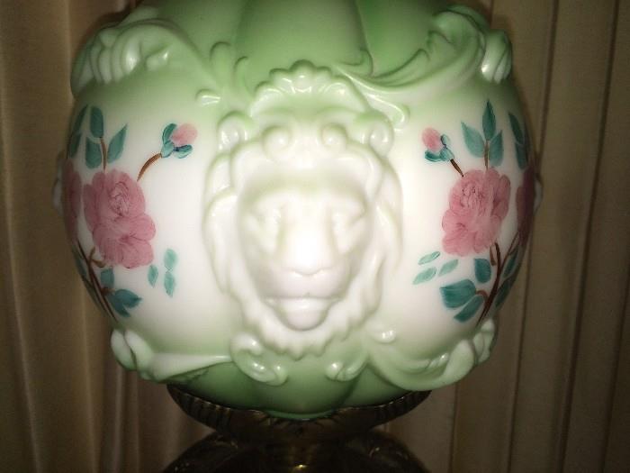 Detail of lion face in top and bottom spheres of GWTW lamps