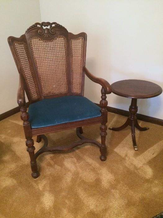 Cane-back antique wing chair with blue velveteen seat